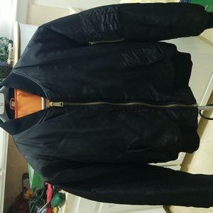 Black men's puffer zip up jacket.